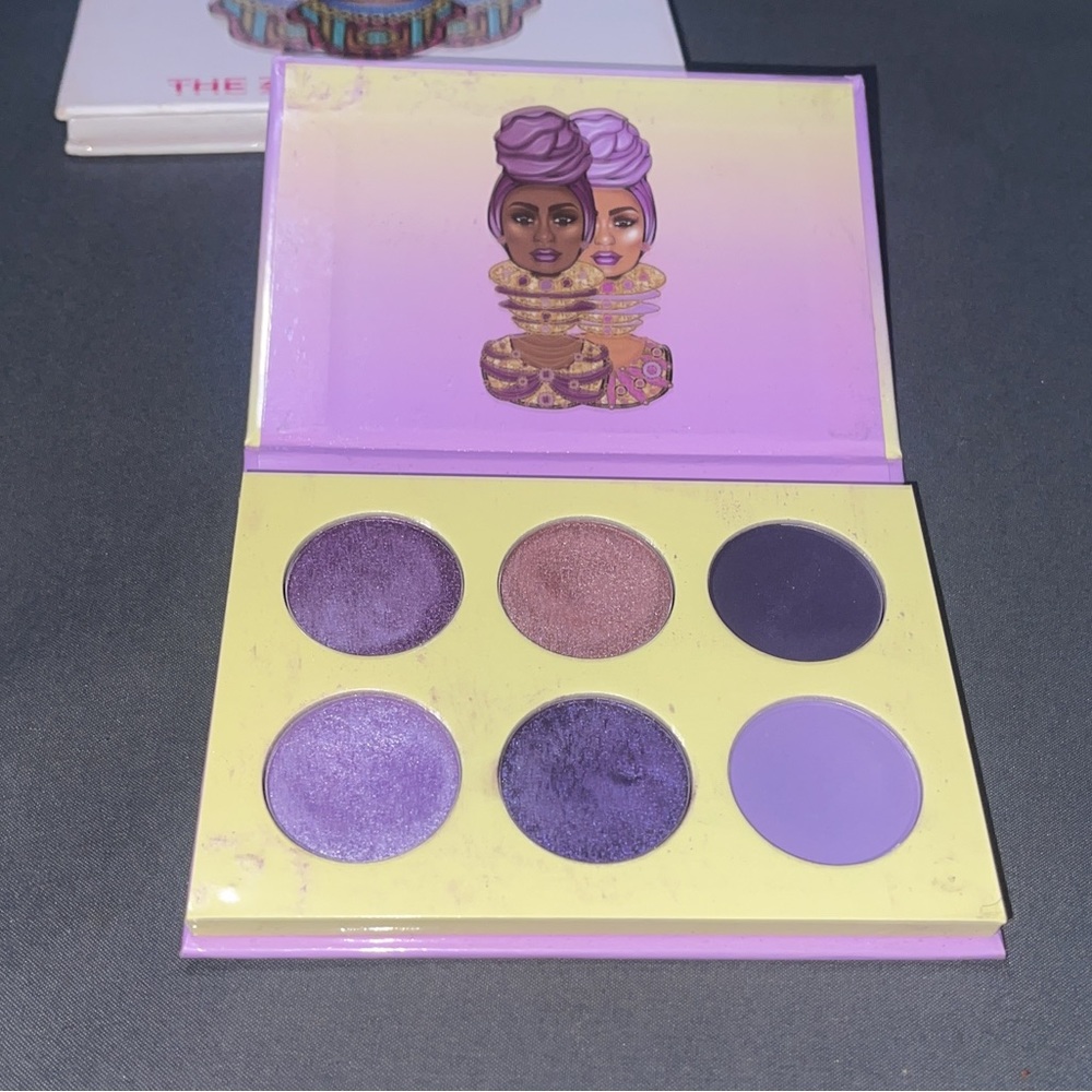 The bottom left purple has been swatches twice but other than never been used